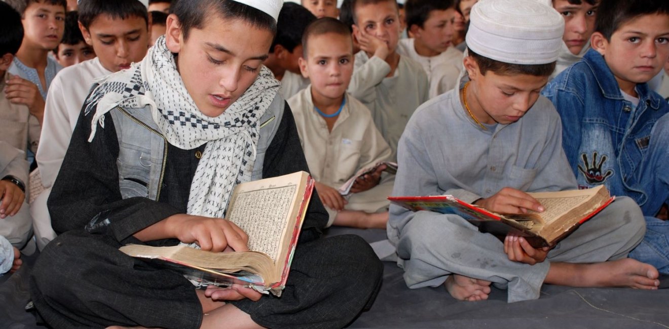 Schoolboys reading the Koran in Afghanistan