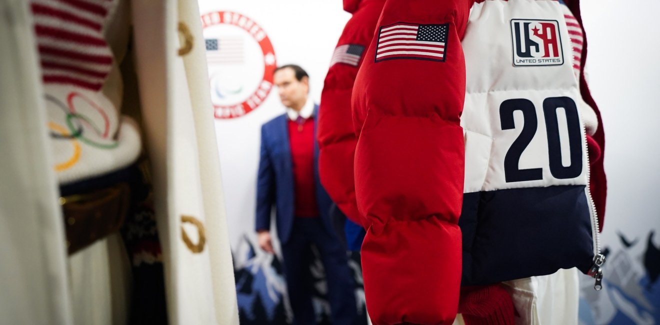 Marco Rubio looking at Team USA uniforms