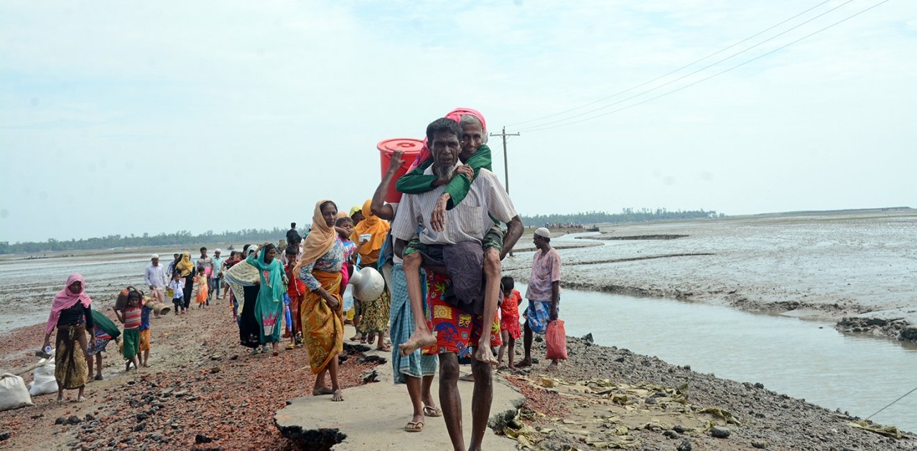 Thousands of Rohingya citizens fleeing from Myanmar are crossing the Bangladesh border at Teknaf and entering Rohingya camps, 2017, Cox's Bazar, Bangladesh.