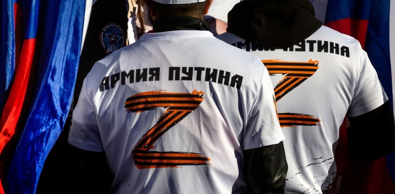 Russian nationalists wearing pro-war "Z" shirts at a rally