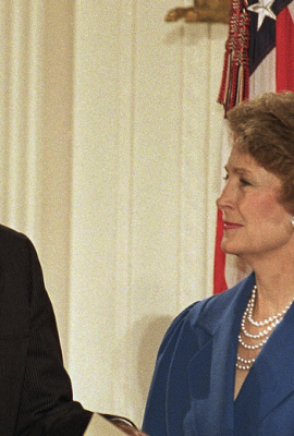 Susan Baker smiles at her husband, James Baker III, as he is sworn in as Secretary of State at the White House in Washington on Friday, Jan. 28, 1989 during a reenactment of the ceremony. Chief Justice William Rehnquist swears Baker in, second from right as President George H. Bush looks on, right. Baker was officially sworn in a private ceremony on Wednesday at the State Department.