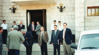 Keays standing with other diplomats