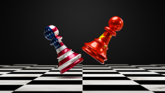 Chess pieces representing the US and China bounce off one another