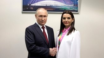 image Vladimir Putin and Evghenia Guțul