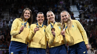 Gold medalists Olena Kravatska, Alina Komashchuk, Olga Kharlan and Yuliya Bakastova during the victory ceremony for the women's team sabre event at the Grand Palais during the 2024 Summer Olympics.