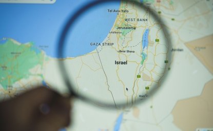 Map of Israel and Vicinity Showing Gaza Strip under a magnifying glass