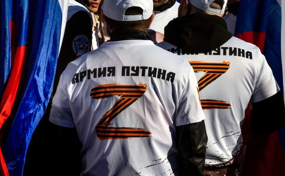 Russian nationalists wearing pro-war "Z" shirts at a rally