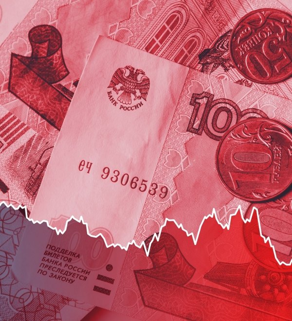 A line graph indicating the ruble's plummeting value overlays a close-up shot of ruble notes and coins.