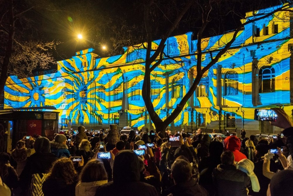 Blue and Yellow projection on a building 