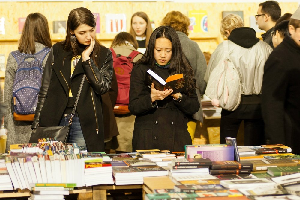 People reading in a bookstore