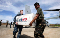 US and Philippine soldiers unload relief supplies for typhoon survivors at Guiuan township, Eastern Samar province in central Philippines, November 20, 2013. Humanitarian efforts from all over the world, led by the United States, were in central Philippines following Typhoon Haiyan, that displaced hundreds of thousands of people. AP Photo/Bullit Marquez.