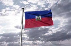 Haitian Flag Over Cloudy Sky