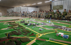 U.S. Army, Royal Canadian Regiment and Italian Esercito soldiers are briefed on the upcoming operations a part of Steadfast Javelin II on Rhein Ordnance Barracks, Germany, Sept. 3, 2014.